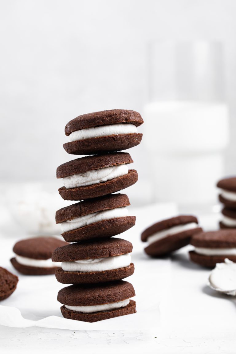 Five gluten-free oreos stacked on top of each other.