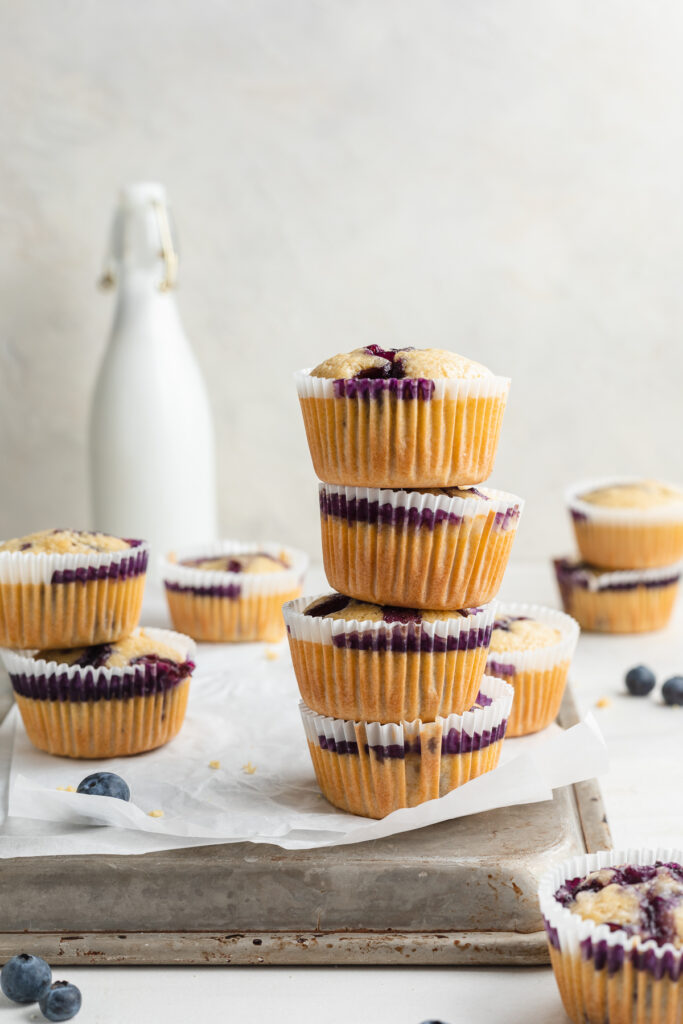 stack of four gluten-free blueberry muffins.