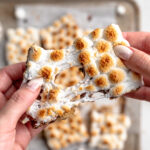 a s'mores bar being pulled apart.