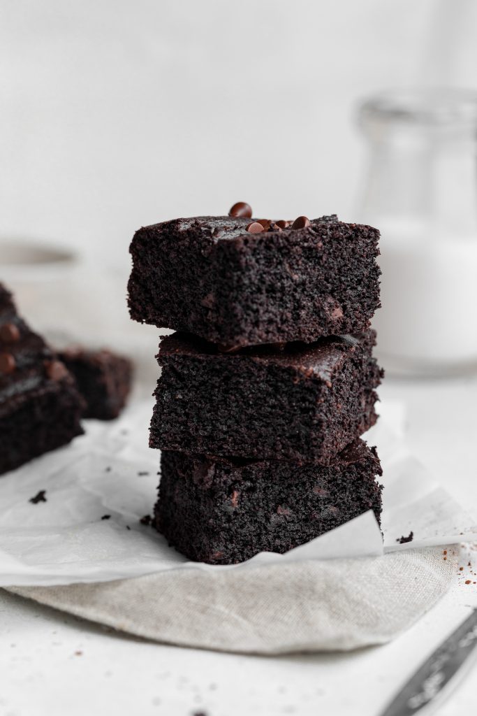 three paleo brownies stacked on top of each other