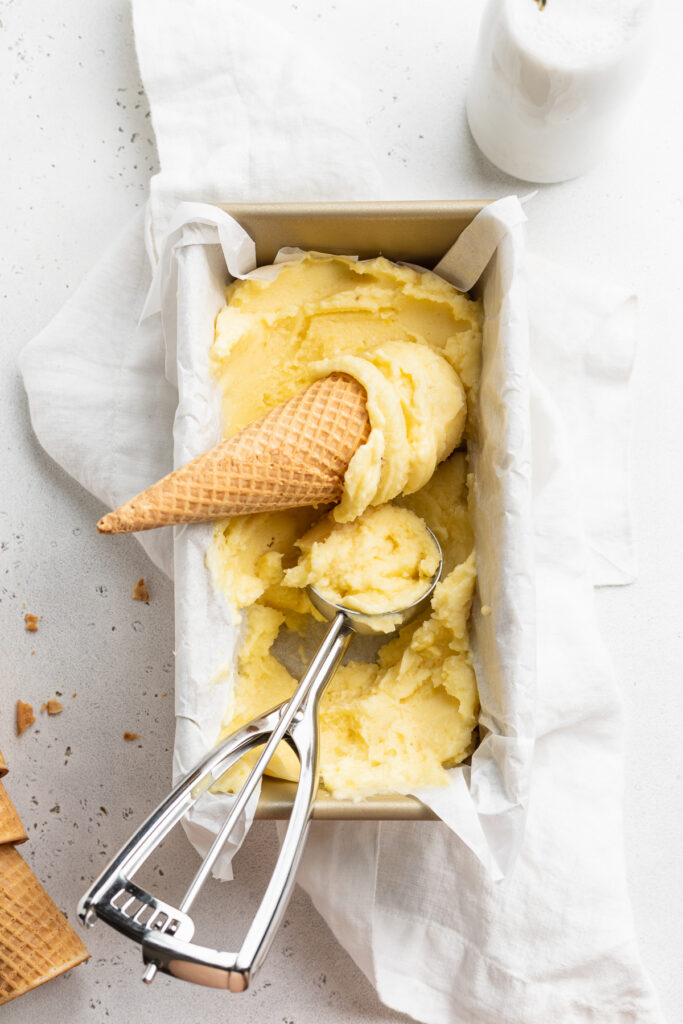 overhead image of pineapple ice cream in a loaf pan