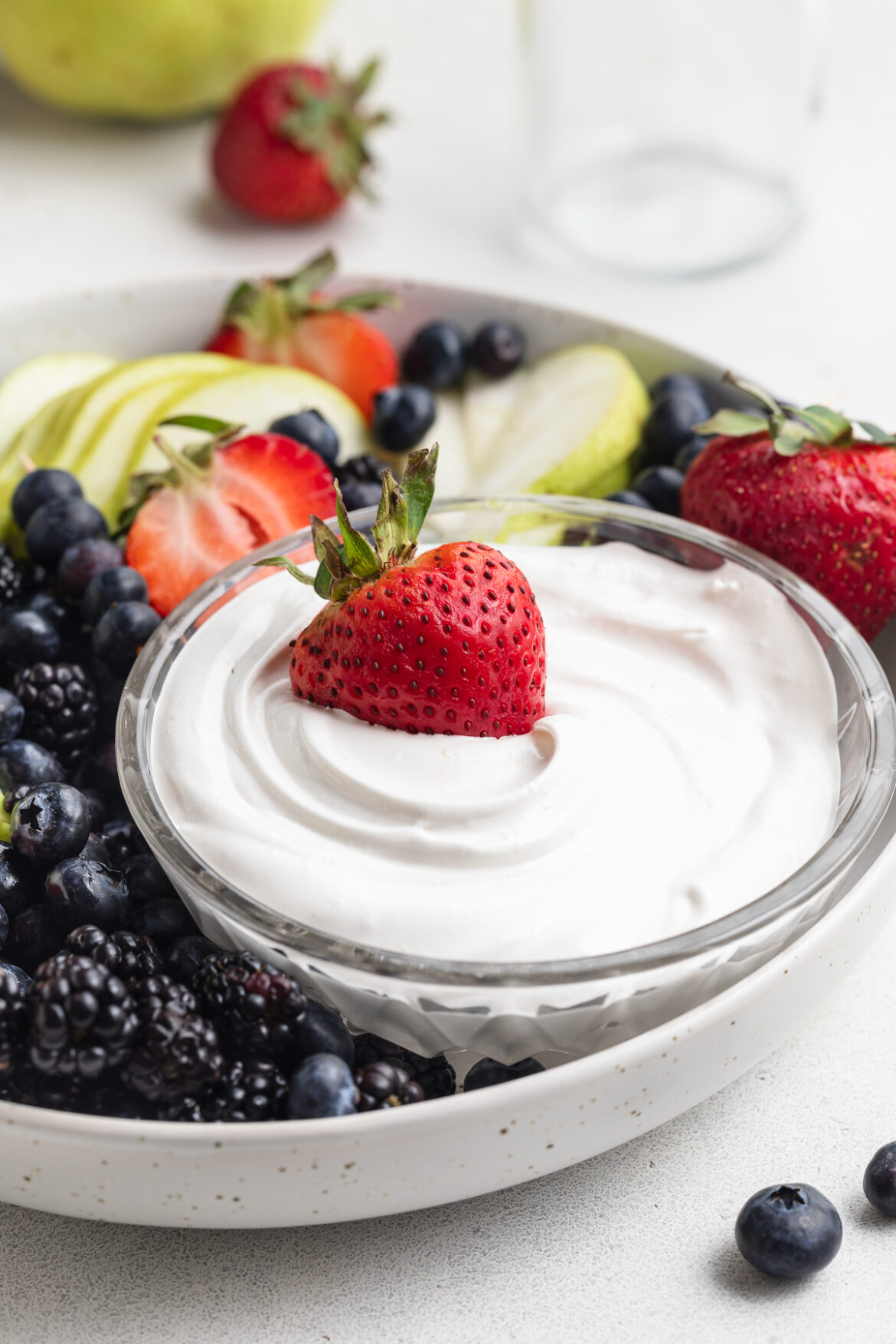 Marshmallow Fruit Dip (just 4 ingredients!) fresh strawberry in marshmallow fruit dip.