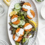 overhead image of air fryer salmon patties on a platter.