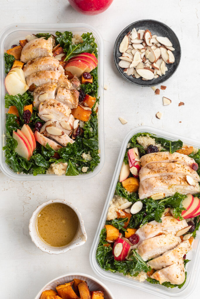 two meal prep containers showcasing this harvest bowl recipe.