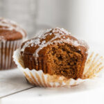 gingerbread muffin with a bite taken out.
