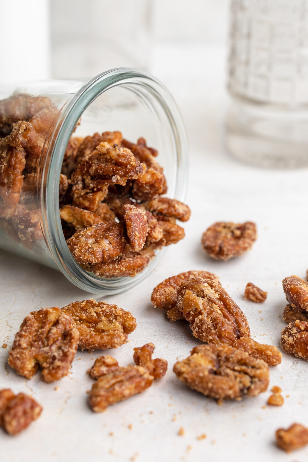 Maple Candied Pecans maple candied pecans tipped out of a jar