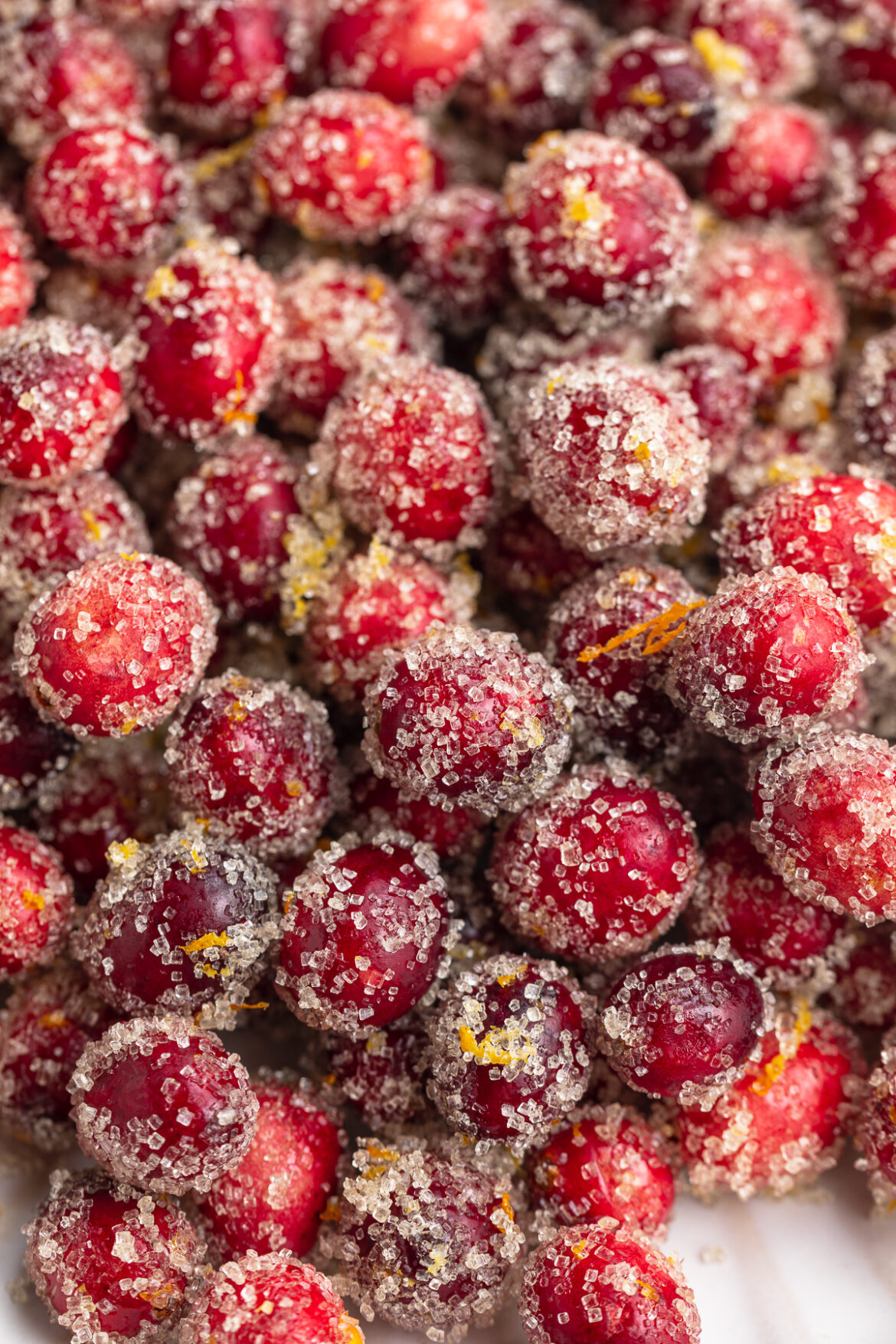 Sugared Cranberries (with a hint of orange!) close up image of sugared cranberries