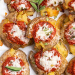 close-up overhead image of pizza smashed potatoes with oregano.