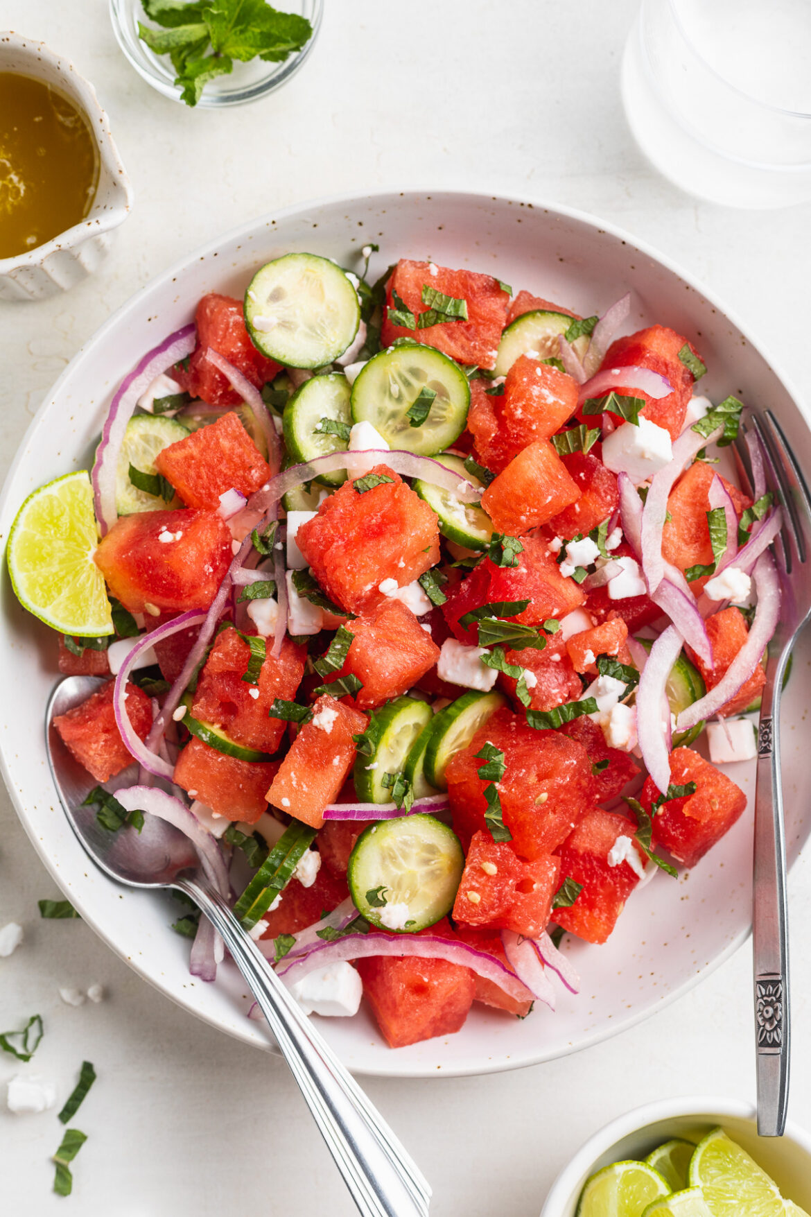 Watermelon Salad with Feta, Mint, and Lime overhead image of watermelon salad in a bowl.