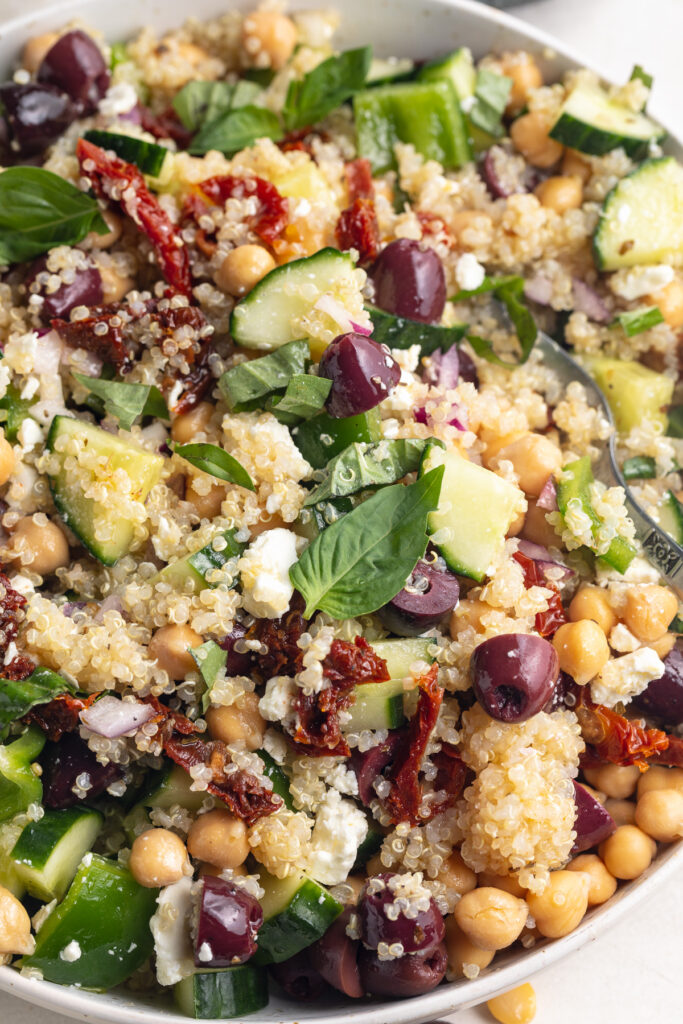 close-up image of mediterranean quinoa salad in a bowl.