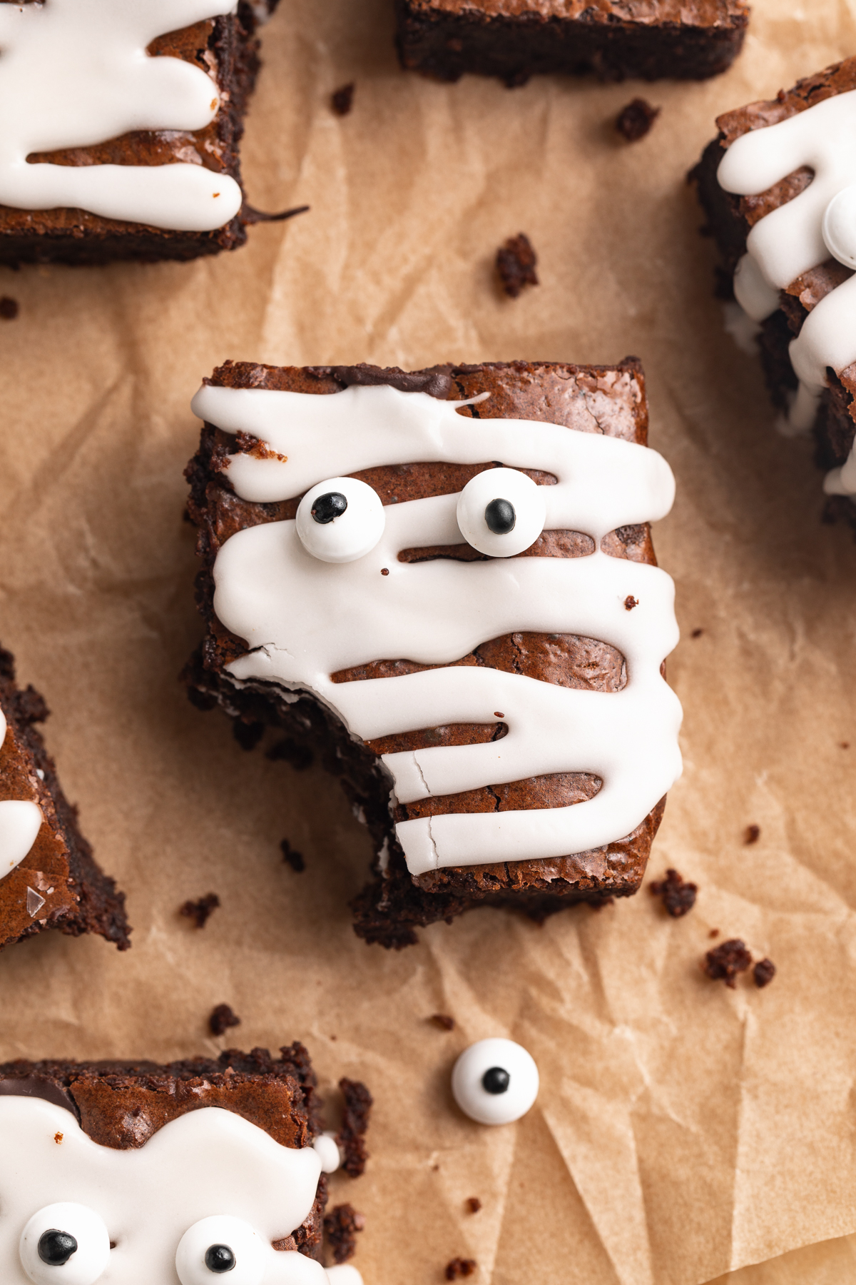 almond flour mummy brownies with a bite taken out.