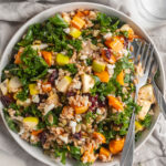 overhead image of thanksgiving salad in a bowl with water on the side.