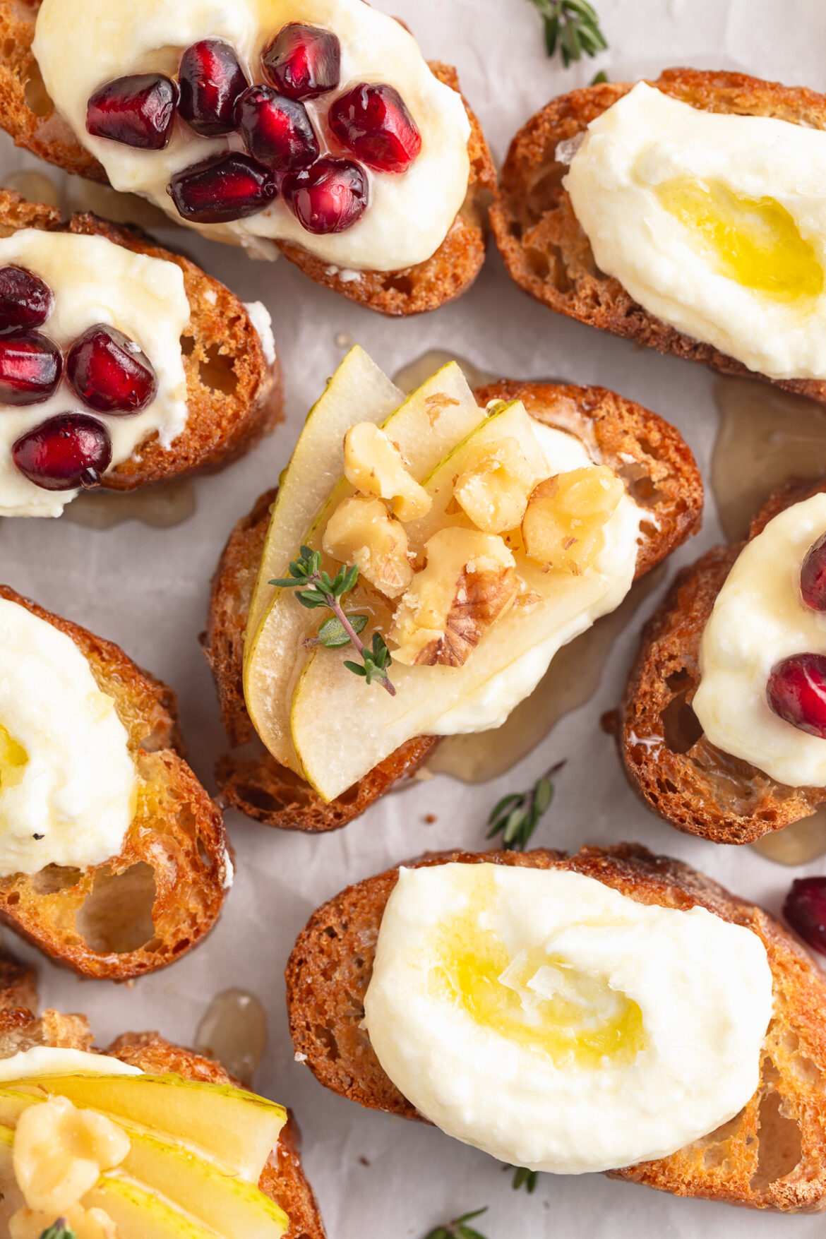 Whipped Feta Crostini Recipe – 3 ways! overhead close up image of whipped feta crostini.