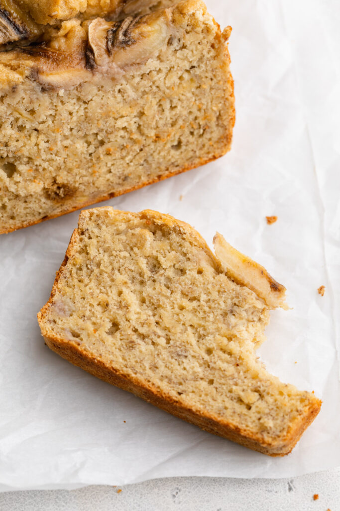 a slice of 4 ingredient banana bread with a bite taken out.