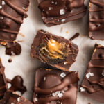 overhead image of healthy snickers cut in half with peanut butter inside.