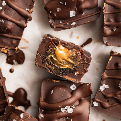 overhead image of healthy snickers cut in half with peanut butter inside.