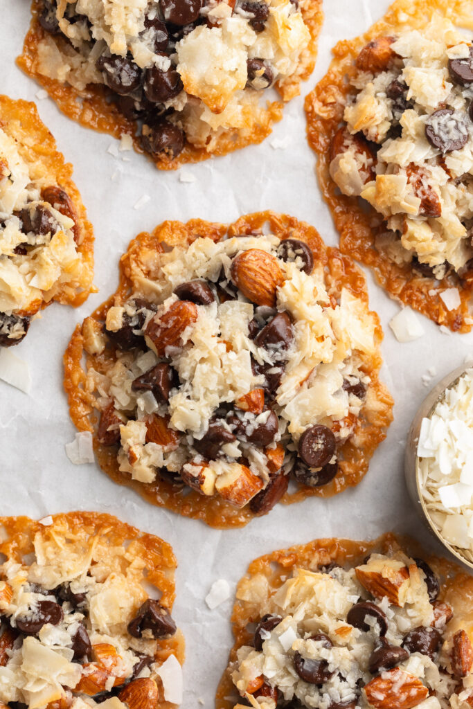 overhead image of 4 ingredient almond joy cookies on a baking sheet.