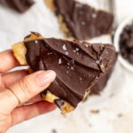 4 ingredient gluten free cookie dough bark piece with sea salt on top.