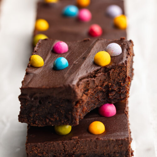 healthy gluten free cosmic brownie with a bite taken out