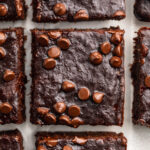 overhead image of 3 ingredient brownies with mini chocolate chips on top.