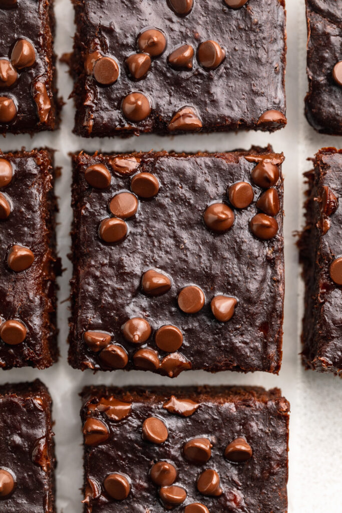 overhead image of 3 ingredient brownies with mini chocolate chips on top.
