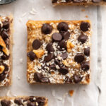 overhead image of a healthy gluten-free magic bar with chocolate chips on top.