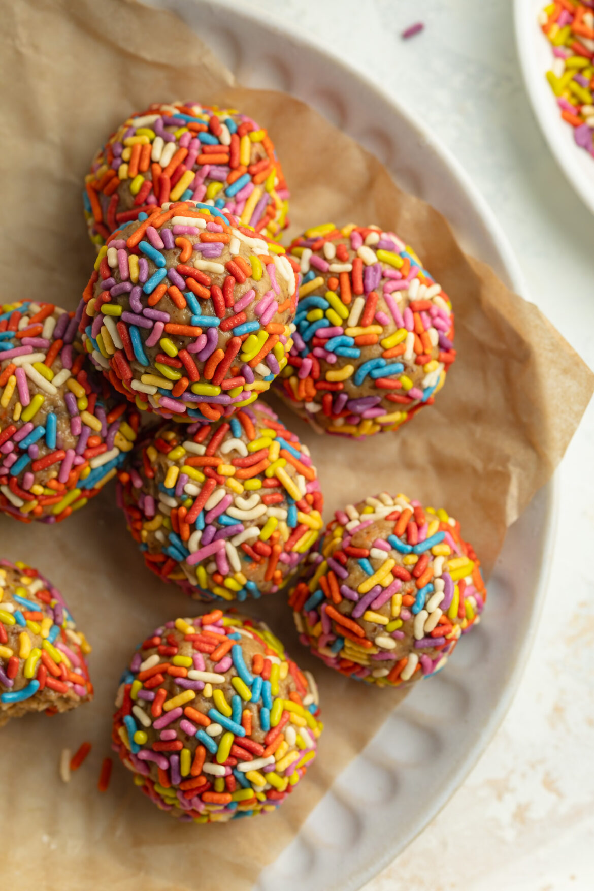 Birthday Cake Energy Bites overhead image of birthday cake energy bites on a plate.