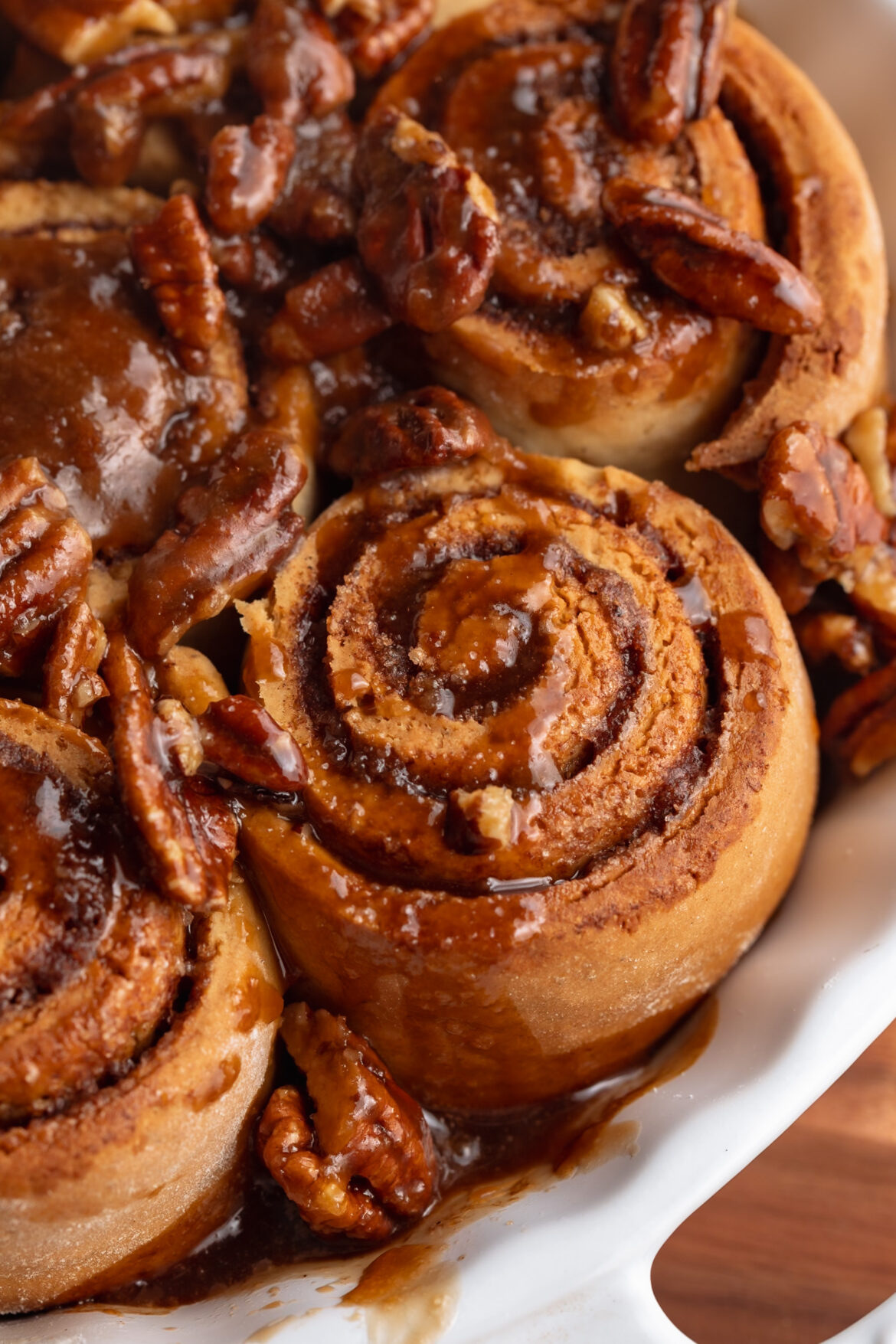 Gluten-Free and Dairy-Free Cinnamon Rolls (with sticky pecans!) gluten free dairy free pecan cinnamon rolls in a baking dish.