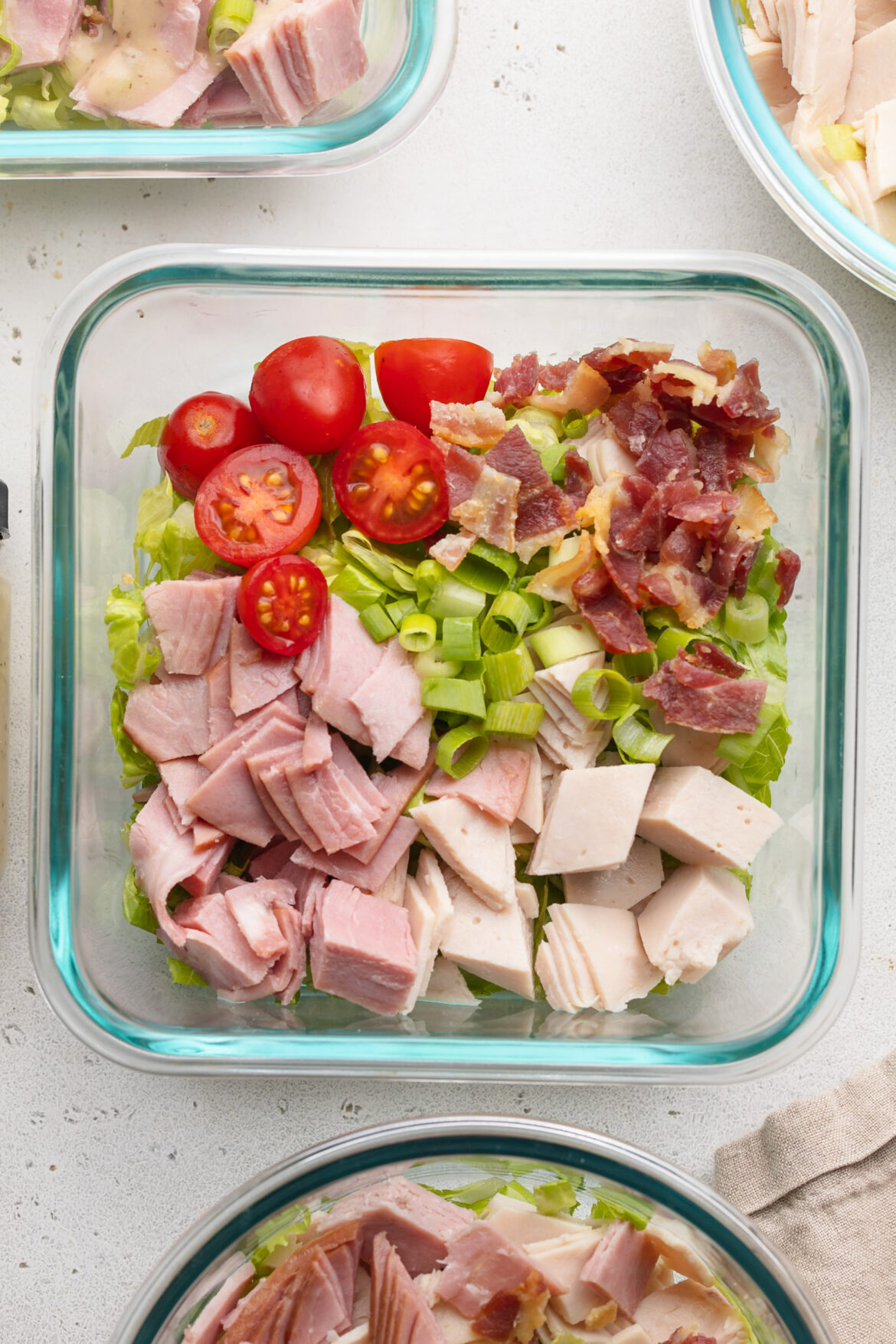 Meal Prep Turkey Club Chopped Salads overhead image of a meal prep turkey club chopped salad.