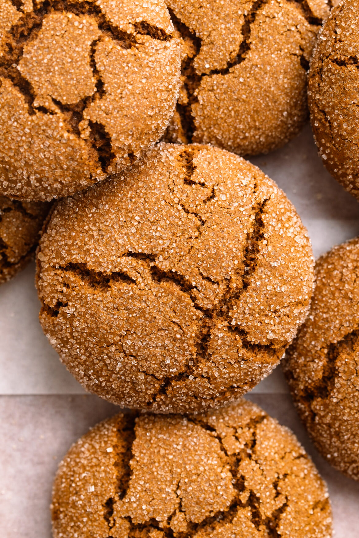 overhead image of gluten-free molasses cookies on a table.