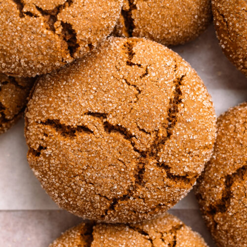 overhead image of gluten-free molasses cookies on a table.