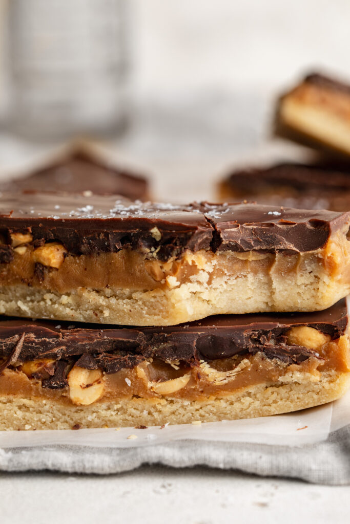 a close up bite shot of a healthy snickers bar.