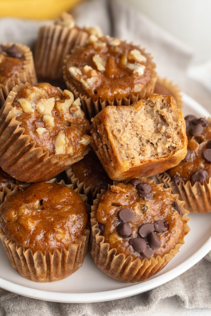 mini banana muffin with a bite taken out.