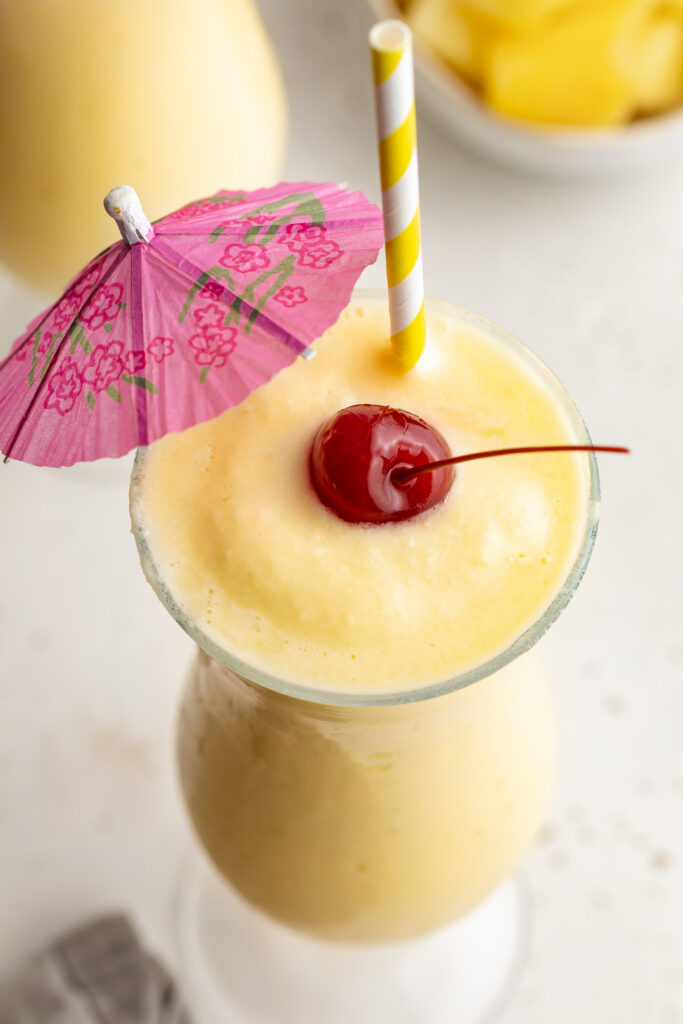 overhead close up image of a easy 3 ingredient pina colada in a glass.