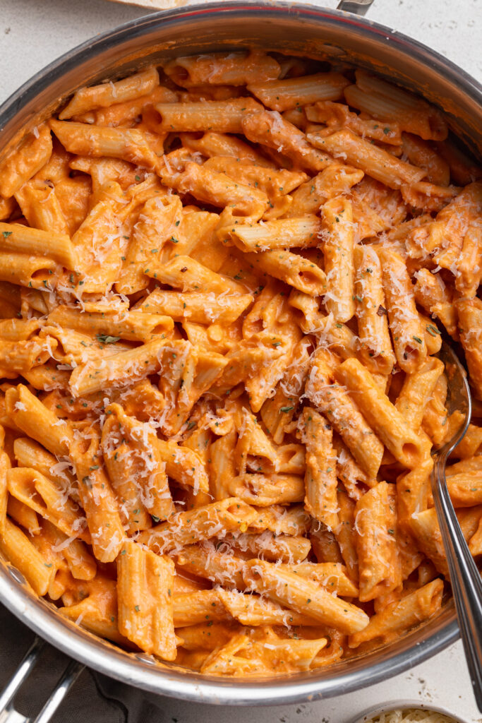 overhead image of cottage cheese vodka pasta in a large skillet.