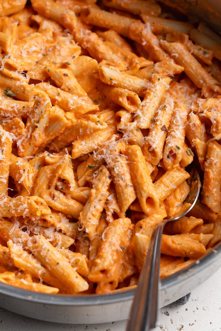 Cottage Cheese Vodka Pasta cottage cheese vodka pasta in a skillet with a spoon.