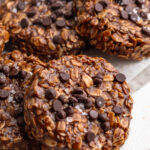 no bake cookies piled on top of each other on a table.