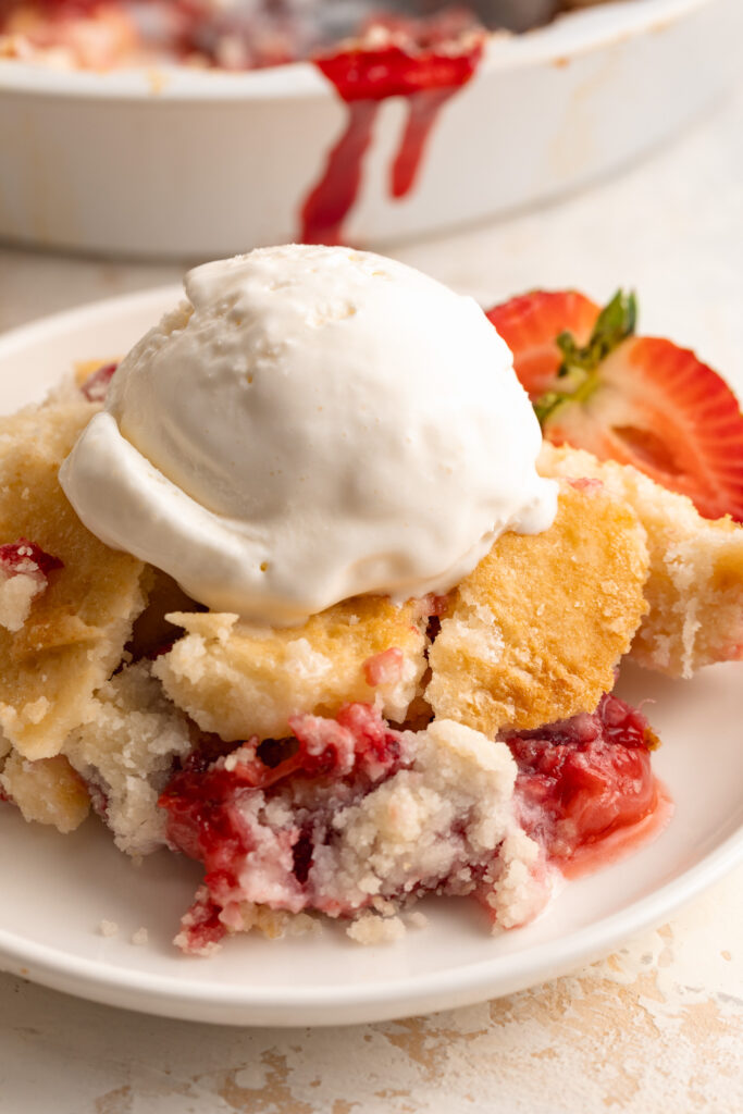 3 ingredient strawberry dump cake on a plate.