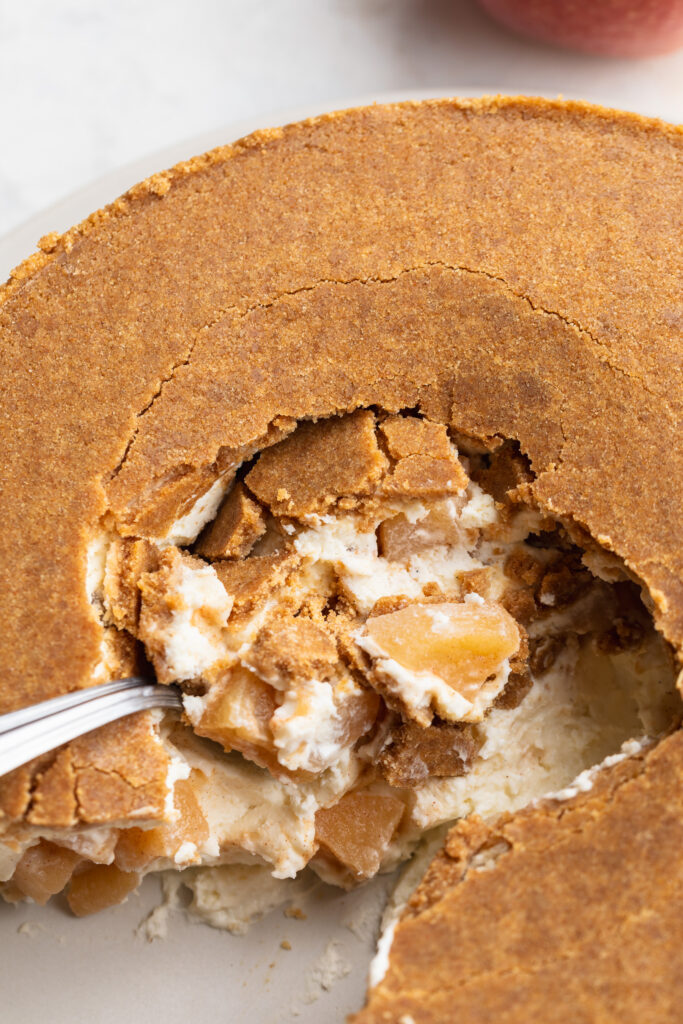 overhead image of upside down cheesecake being scooped into
