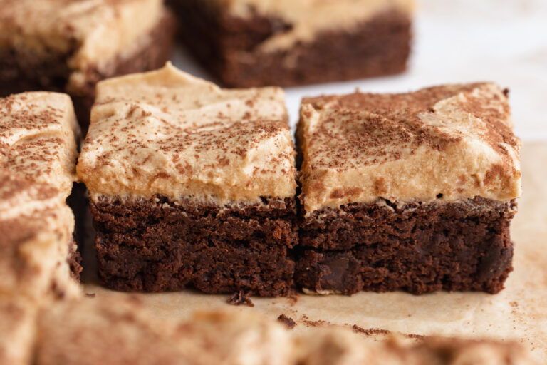 espresso martini brownies lined up on a table.