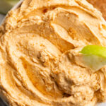 overhead image of pumpkin protein cheesecake dip in a bowl.