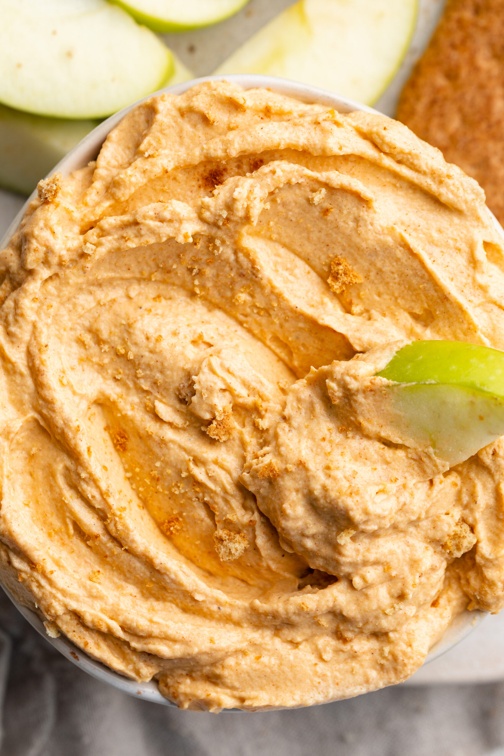 overhead image of pumpkin protein cheesecake dip in a bowl.