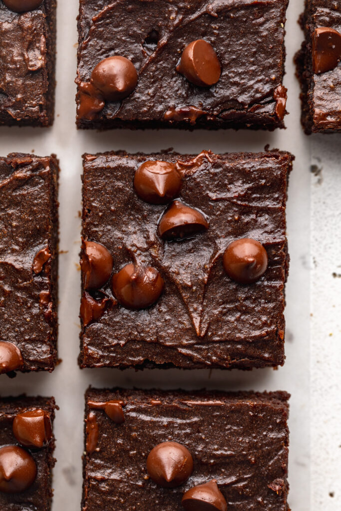 overhead image of sweet potato brownies cut into squares.