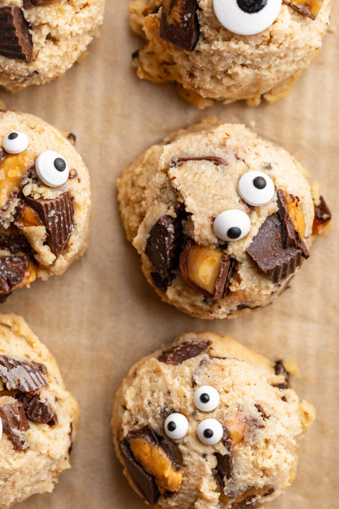 overhead image of cottage cheese monster cookie dough bite on a baking sheet.